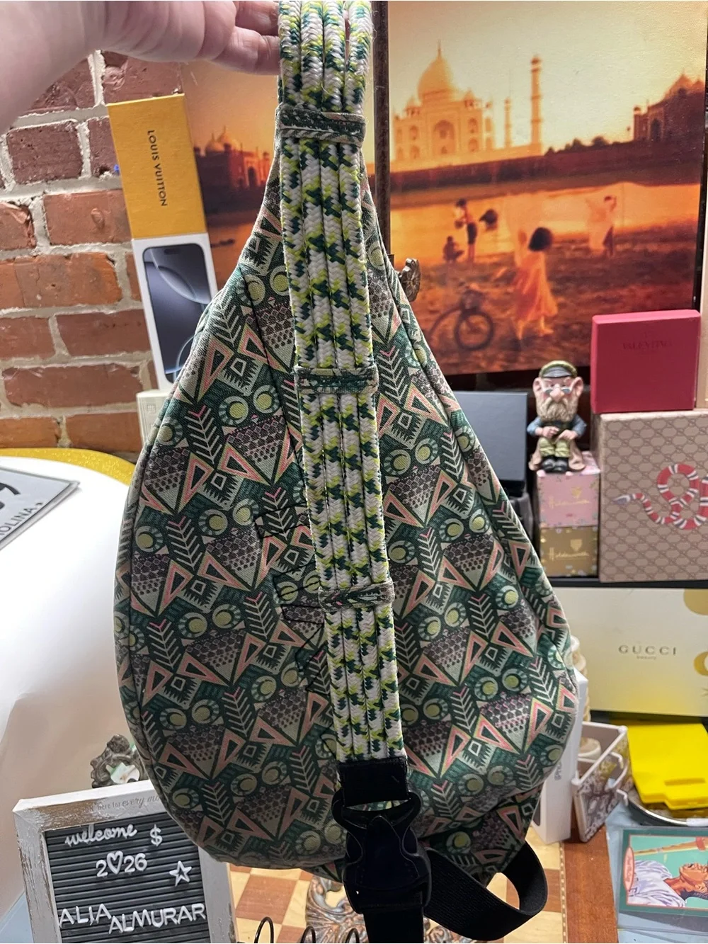 print KAVU Rope Bag featuring lime-green zippers and an owl motif accent.